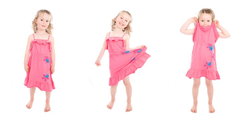 Photographs of a happy girl in a pink dress.